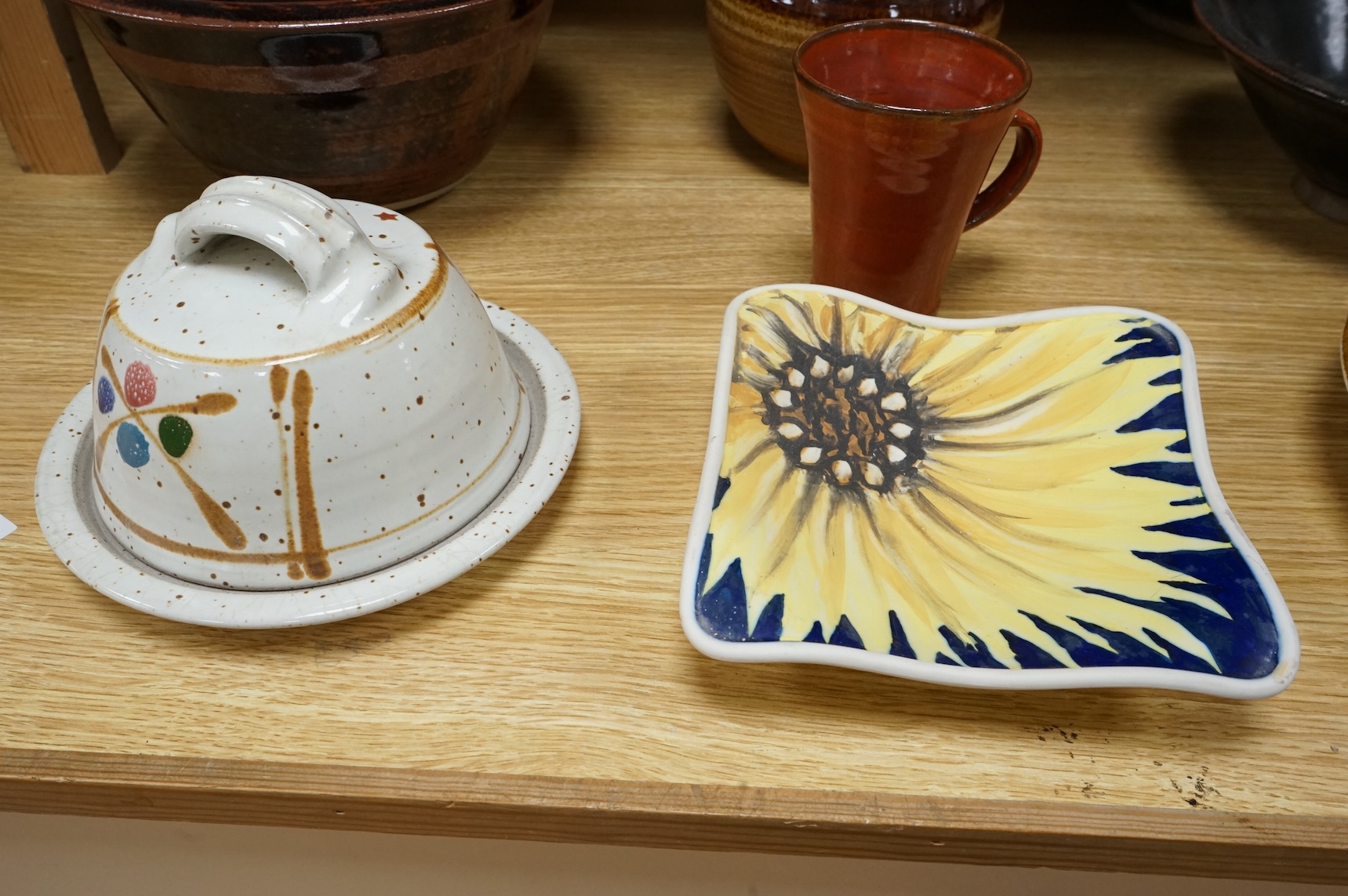 A Poole pottery Aegean dish, together with a selection of Studio pottery bowls, dishes, jugs etc and a Donoghue / Rye cottage model, Poole dish 20cm diameter (14)